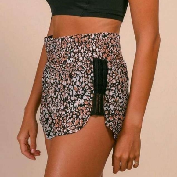 Free People Movement Run Wild Printed Shorts in Leopard Brown - Picture 1 of 5